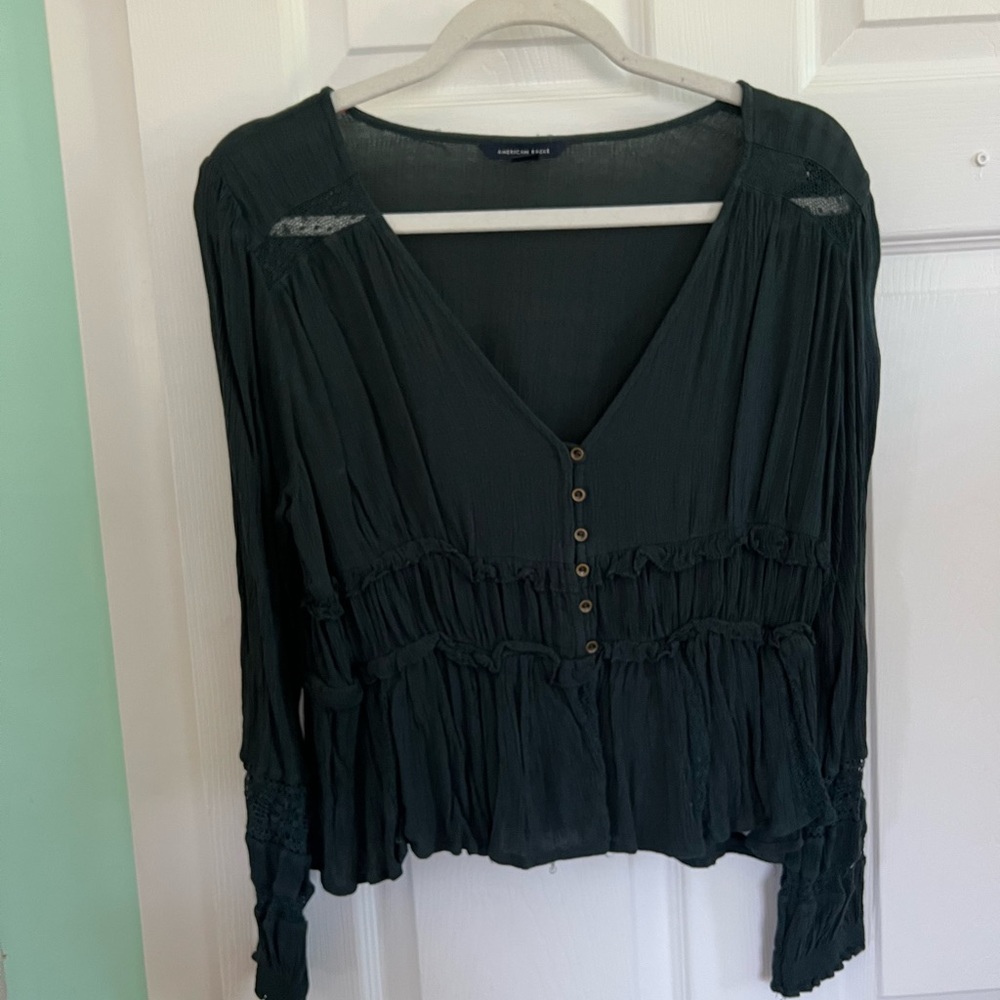 Green long sleeve shirt. Size Medium